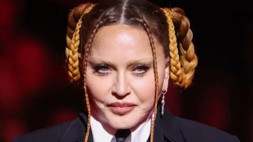 Madonna postpones tour after intensive care stay