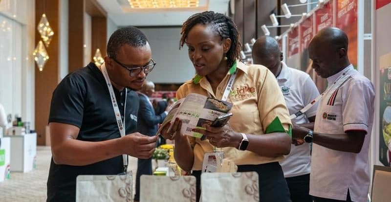 Participants learn about Kenyan coffee at the exhibition of the China-Kenya Business Forum held in Nairobi, Kenya, March 23, 2026. (Xinhua/Xie Jianfei)
