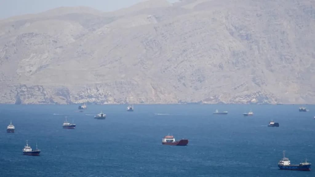 US threatens shipping firms with sanctions if they pay Iran tolls