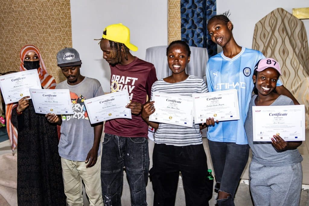 Caption. Graduates of the World Bank-backed informal settlements improvement programme at Matopeni, Kayole, Nairobi County.